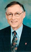 John E. Pless obituary